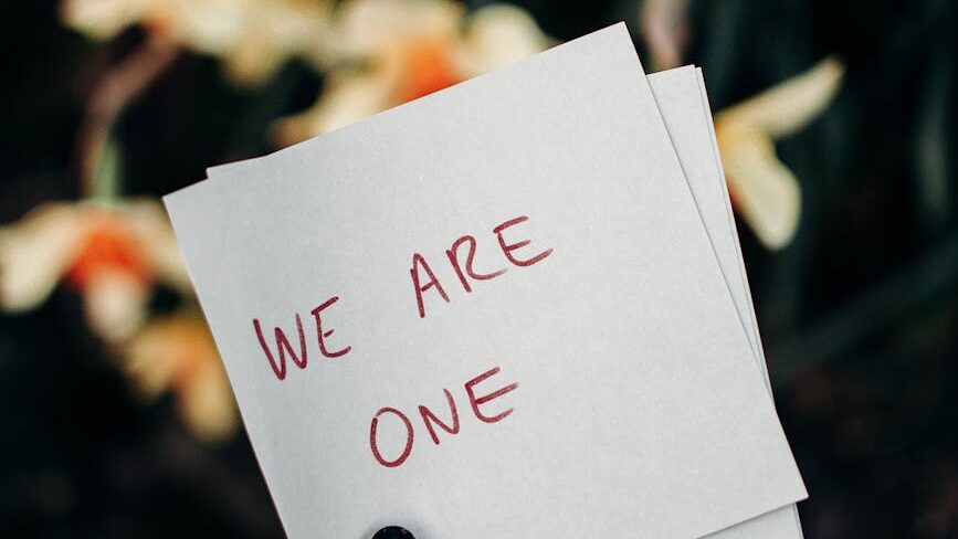 we are one text on white paper