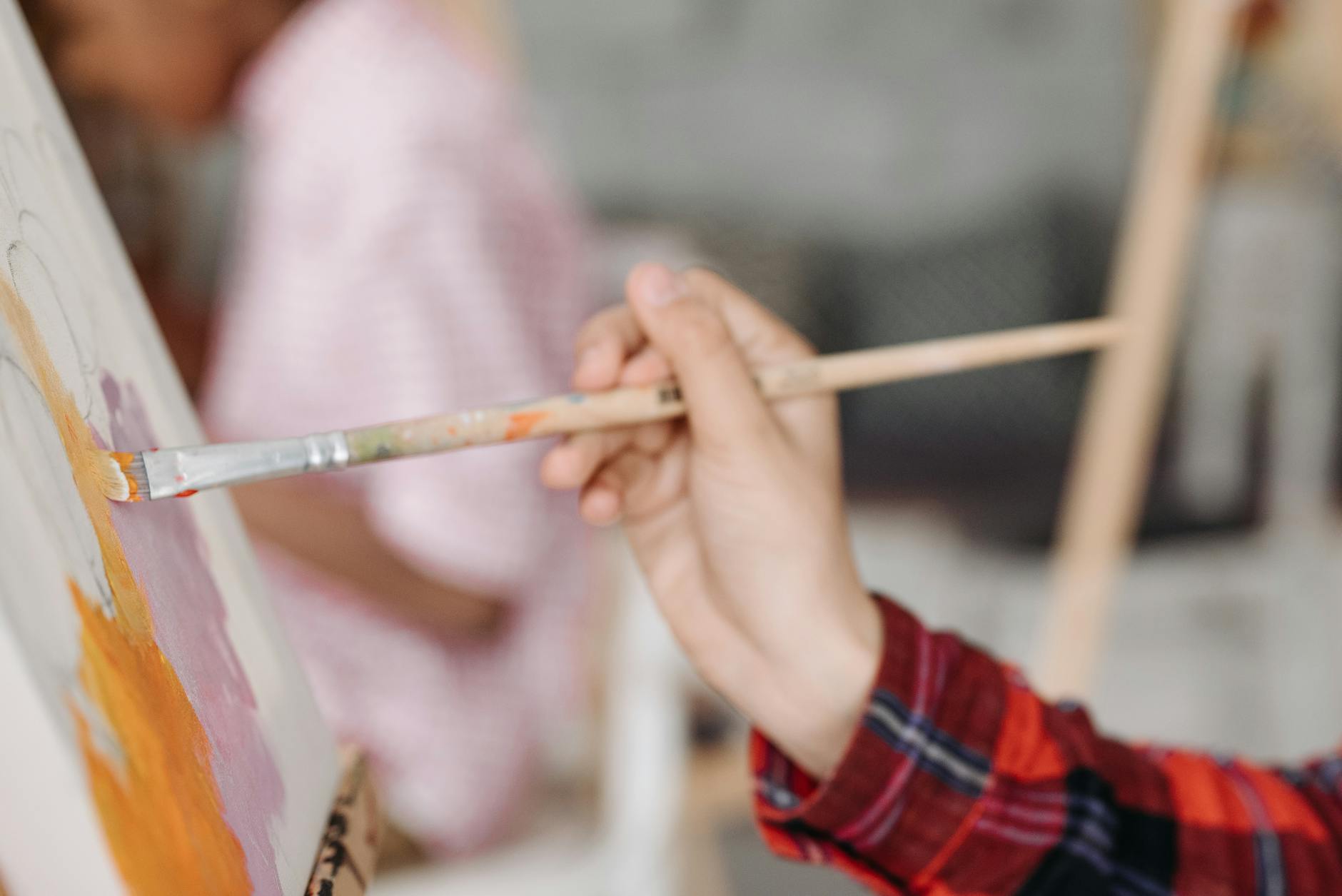 close up shot of a person painting